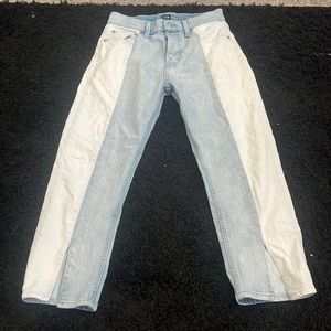 I am selling GAP denim pants half blue half white with slits at the bottom.